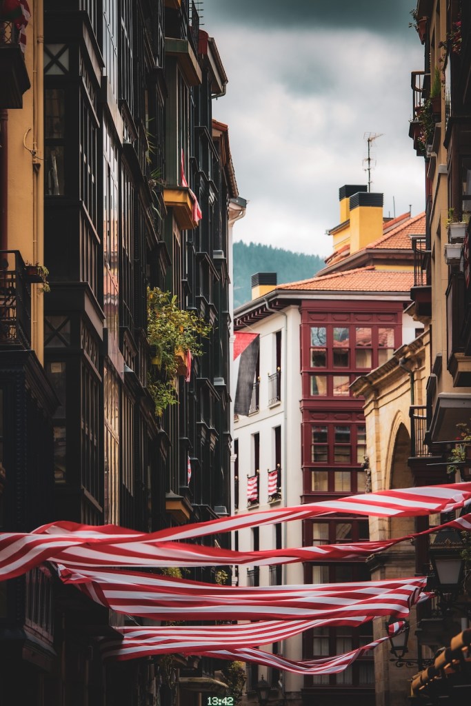 balconies and flags in Bilbao, Spain, April 2024